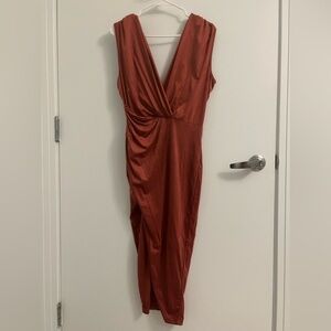 Brand new Fashionova cocktail dress, size medium with a split skirt